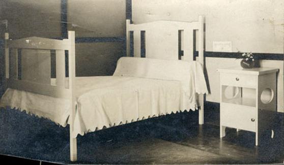 Bedroom in a student summer cottage. The cottages were the equivalent, but a homier version, of a residence hall.